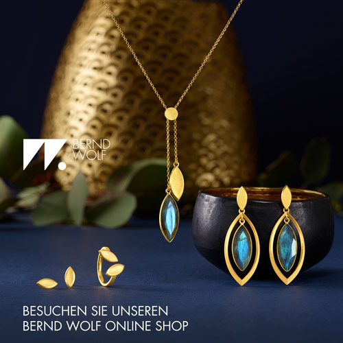 Bernd Wolf Shop Kette mit anhänger mit funkelndem zirkonia und 24 karat goldplattierung. bernd wolf shop