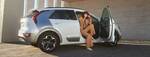 Bild Kia Flex Abo Kia Niro EV. mit Frau 